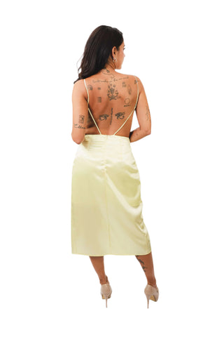 Back view of Daisy Yellow Lace Dress featuring open back design with thin straps.