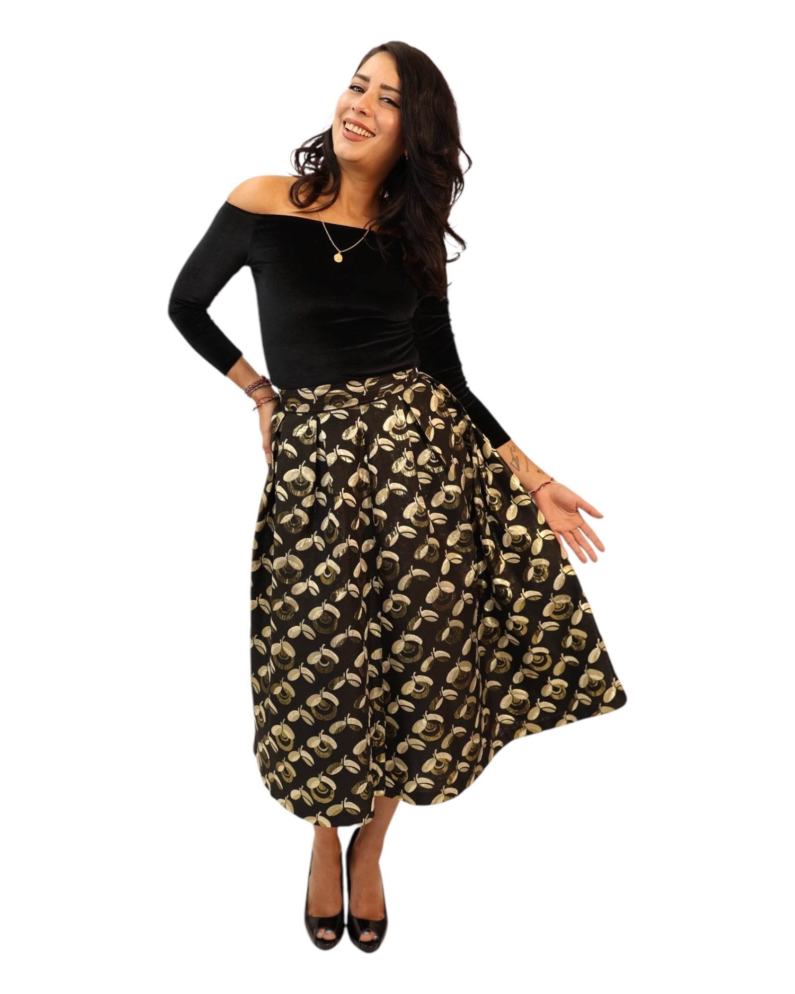 Charlotte Black Gold Midaxi Skirt with golden floral design, paired with black off-shoulder velvet top.