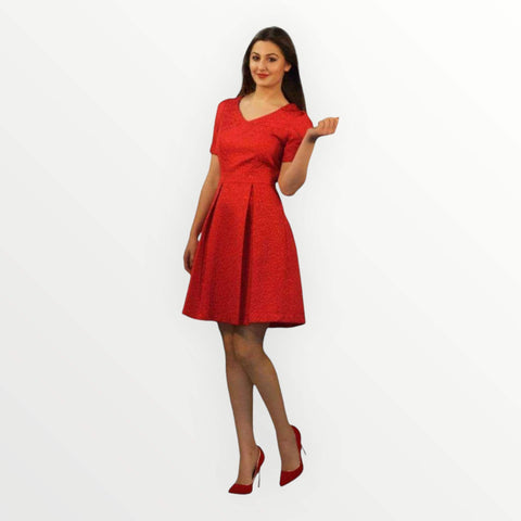 Skater red dress flared with short sleeves, feminine fit, 100% polyester.