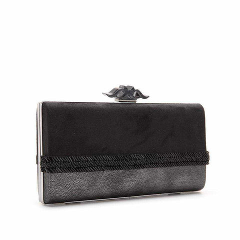 Rectangular two-tone Carolina cocktail clutch with decorative trim and Abbacino swallows closure.