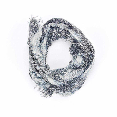 Monochrome dainty leaf print scarf with tassel trim.