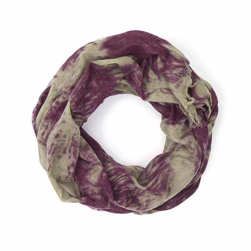 Two-tone multicolor Echarpe Miriam scarf with blurred plant motifs and small fringes.