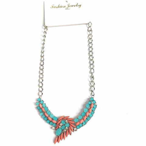 Pink and blue feathered stone necklace on silver chain.