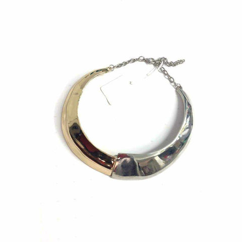 Gold metal hardware necklace with a gold chain.