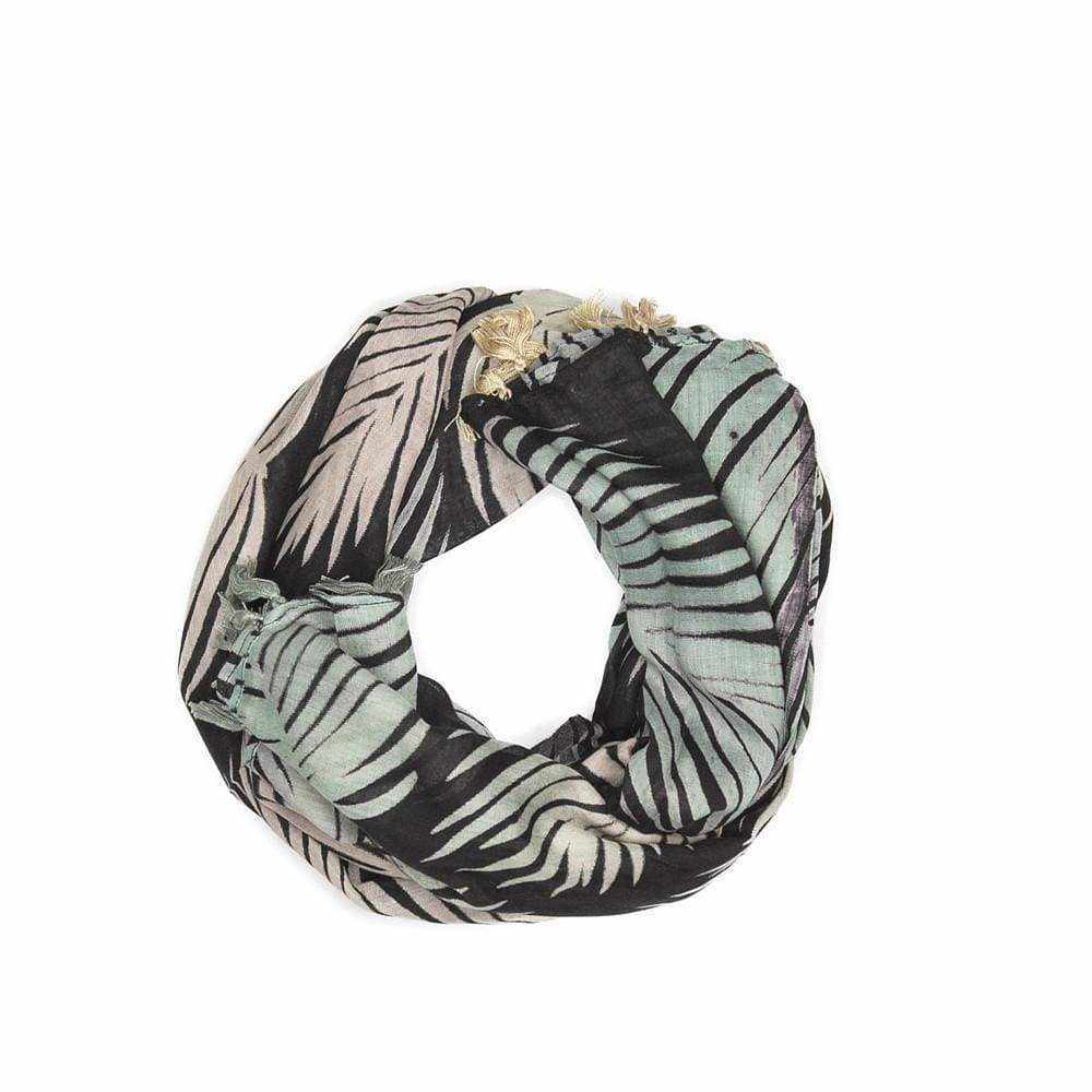 Pastel tropical leaf print scarf with bright tassel trim.