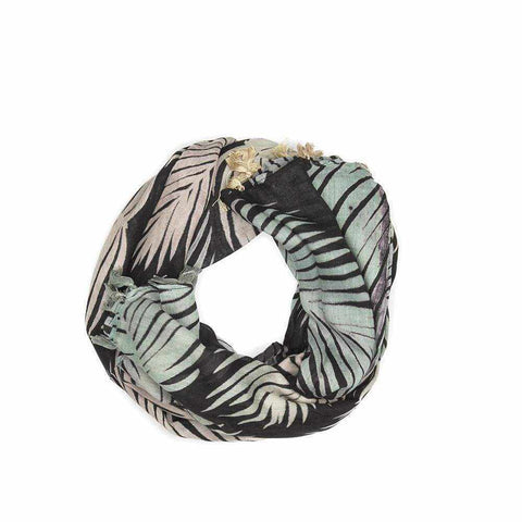 Pastel tropical leaf print scarf with bright tassel trim.