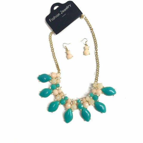 Turquoise and coral necklace and earring set with gold metal chain.