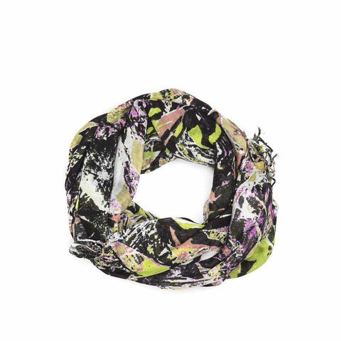 Vibrant print scarf with bold mixed patterns in black, yellow, and green.